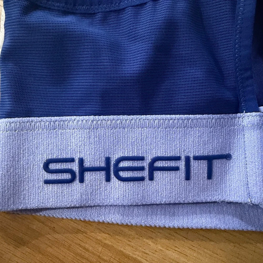 SHEFIT NWOT Ultimate Sports Bra Blue Size 2 Luxe High Impact Front Zip Wash Bag - Picture 5 of 6
